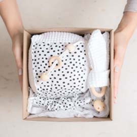 Soft hooded baby towel snuggly post-bath essential by Evara